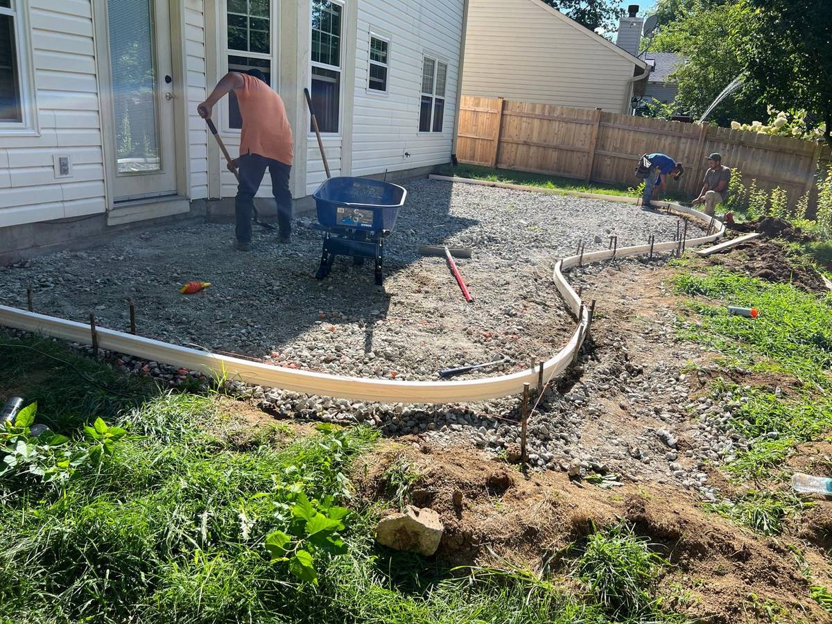 Concrete being finished by hand