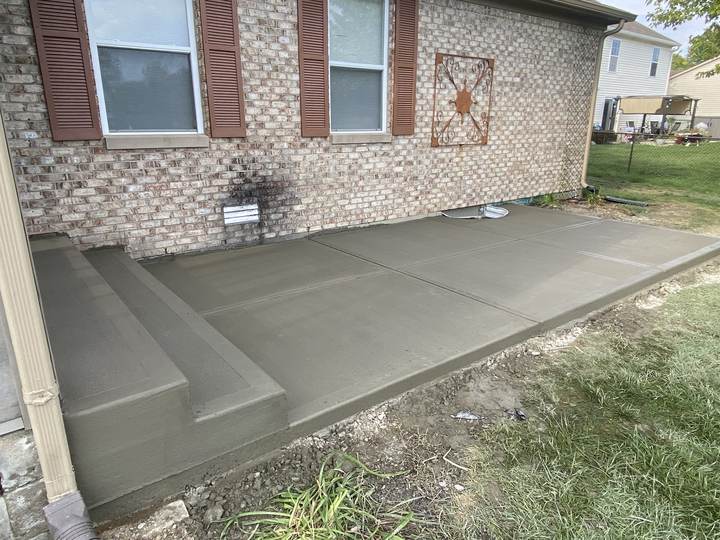 Patio and walk running along the house in Brownsburg, Indiana
