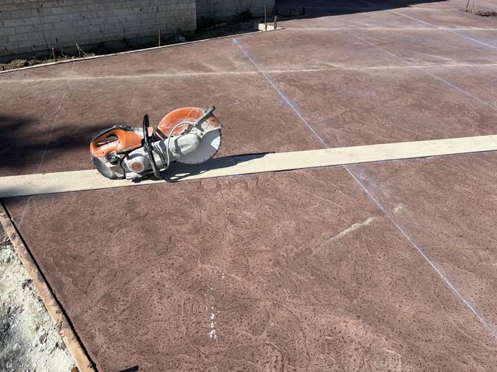 Colored slab, joints being cut in Carmel, Indiana