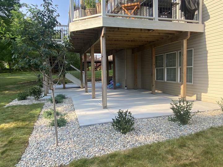 Walk connecting to an under-deck patio in Carmel, Indiana