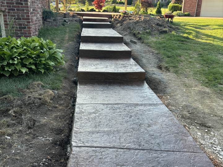 Stamped walk and steps up to a pergola entry in Carmel, Indiana