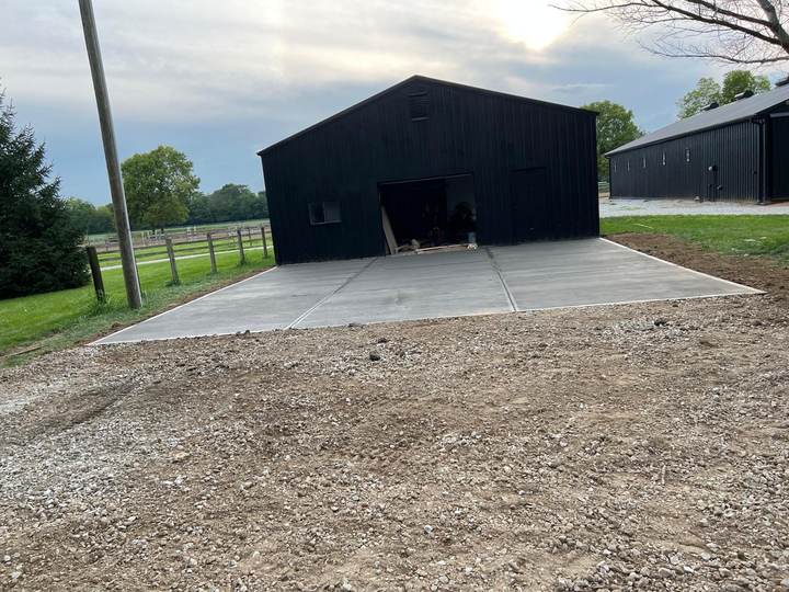 Concrete apron at a large steel building