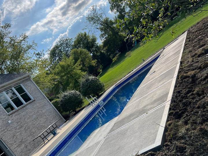 Concrete deck around an inground pool