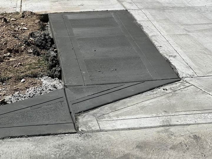Replaced sidewalk panel next to the original walk