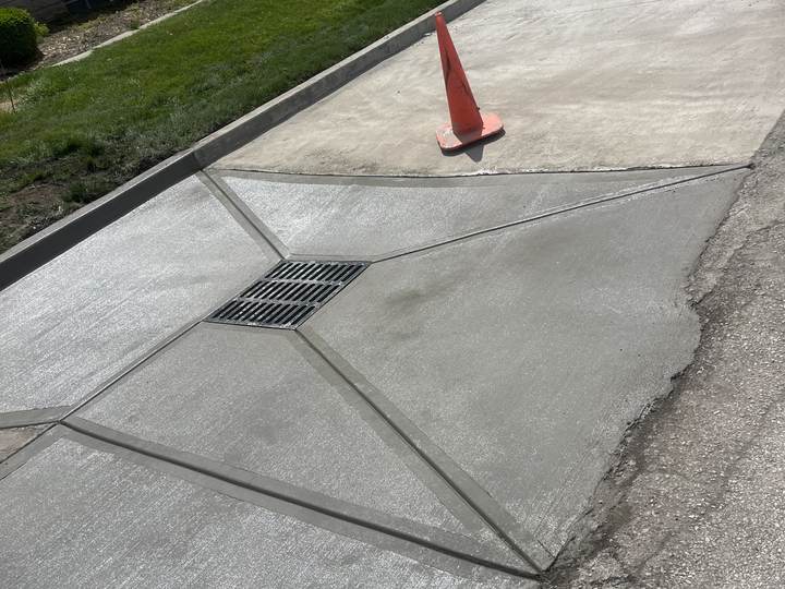 Driveway with a channel drain at the apron in Indianapolis, Indiana