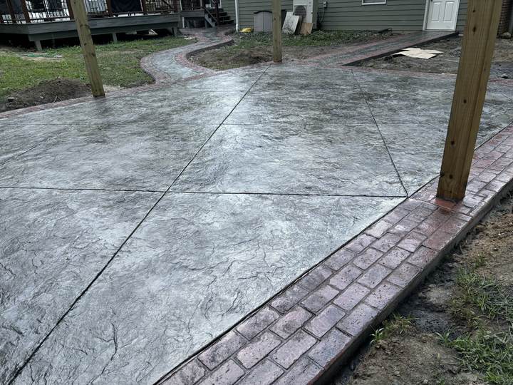 Stamped patio with a brick soldier border in Indianapolis, Indiana
