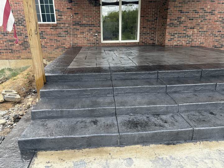Stamped steps and patio at a brick home in Plainfield, Indiana