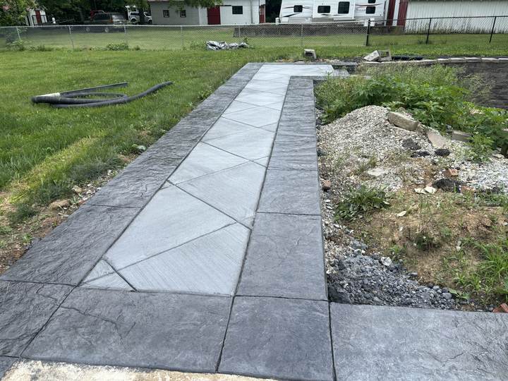 Stamped walkway with a contrasting border in Plainfield, Indiana